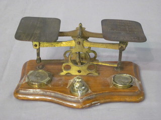 A pair of letter scales complete with weights