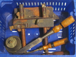 A wooden plane, 3 chisels and a brass bell