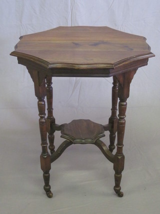 A Victorian shaped mahogany 2 tier occasional table, raised on  turned supports 24"