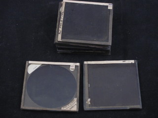 13 various black and white lantern slides, mostly buildings