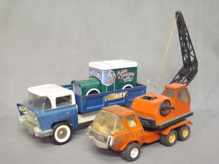 A Tonka model train and a Triang pressed metal truck