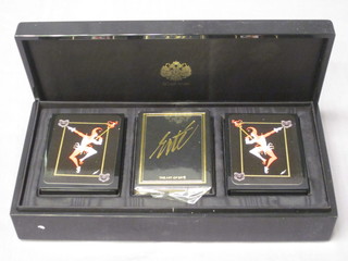A set of Sobranie bridge playing cards contained in a lacquered  box