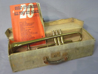 A brass trumpet by Boosey and Hawkes no. 160278