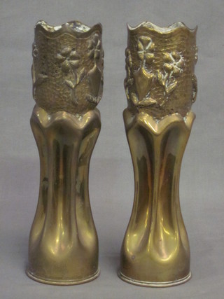 A pair of brass Trench Art vases formed from shell cases