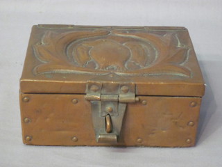 A rectangular embossed copper trinket box with hinged lid  decorated a bird 6"