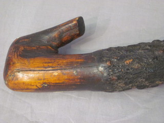 A heavy wooden walking stick