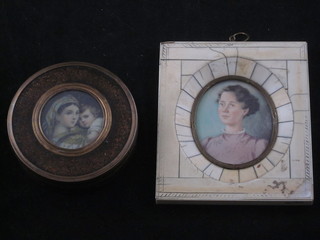 A portrait miniature of a lady 2 1/2" oval contained in an ivory finished frame and a cylindrical box and cover decorated mother  and child 2"