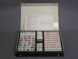 A plastic Mahjong set