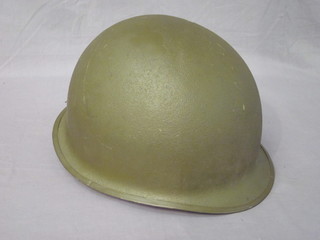 An American steel helmet complete with liner