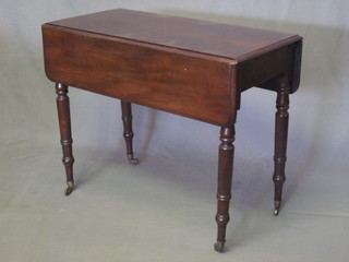 A 19th Century mahogany Pembroke table, raised on turned  supports fitted a drawer 35"