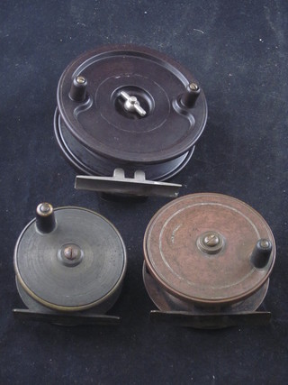 An Alcock's aerial centre pin fishing reel and 2 brass centre pin fishing reels
