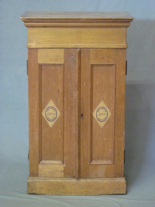 A cedar cigar cabinet with shelved interior, the base fitted a drawer enclosed by panelled doors marked Don Pepin Habana  18"