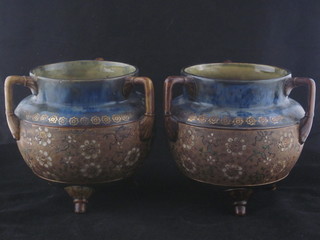 A pair of circular Royal Doulton 3 handled vases 7"