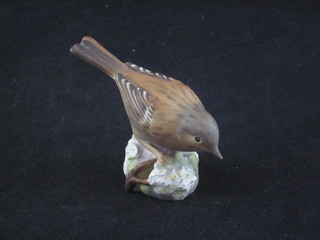 A Royal Worcester figure of a hedge sparrow, base marked 333  2"