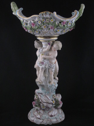 A pair of 19th Century Meissen style porcelain table centres  decorated cherubs 14 1/2", some chips