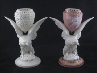 2 19th Century porcelain Pot Pouri vases supported by figures of eagles with outstretched wings, chipped and cracked 8"