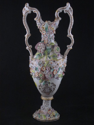 A 19th Century porcelain floral encrusted twin handled vase 13",  f and r)