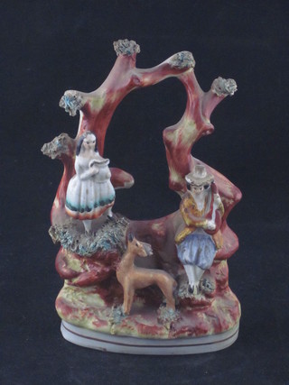 A 19th Century Staffordshire arbour group, lady and gentleman  and deer, 7"