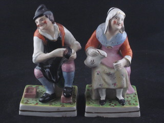 A pair of 19th Century Staffordshire figures of a seated lady and gentleman, chips to base of lady, 6"