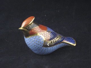 A Royal Crown Derby porcelain figure of a seated bird, base marked LVII