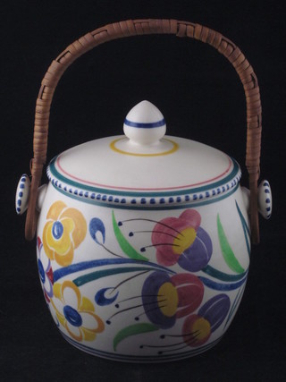 A circular Poole Pottery biscuit barrel, the base with dolphin  mark and incised 230 5"  ILLUSTRATED