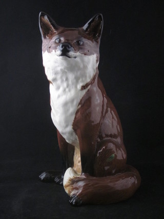 A Beswick figure of a seated fox, marked 2348 12"