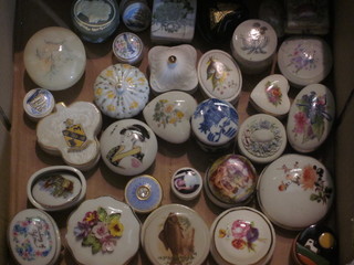 A collection of porcelain trinket boxes
