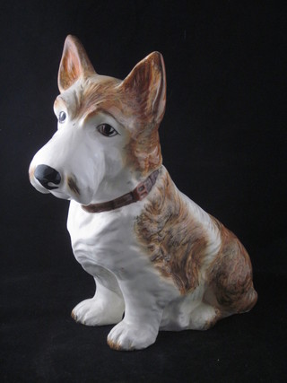 A Sylvac figure of a seated Terrier, the base marked 1209 11"