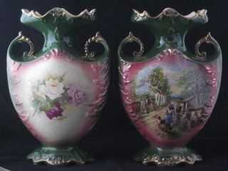 A pair of Edwardian green glazed twin handled pottery vases decorated rural scenes 10"