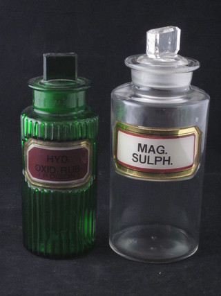 A 19th Century green ribbed chemist jar marked Hydroxide.Rub  7" and a clear glass chemist jar marked Mag Sulph 7"