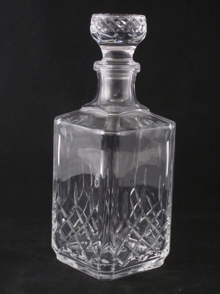 A cut glass spirit decanter and stopper