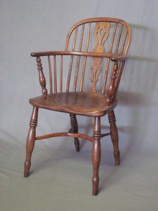A 19th Century elm and yew Windsor carver chair with cown  horn stretcher by E Gabbitass Worksop  ILLUSTRATED