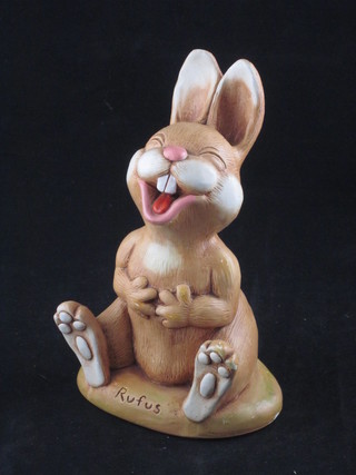 A Moorcraft plaster figure of a seated rabbit marked Rufus 8"