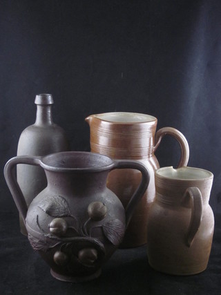 A Trouvills pottery twin handled vase 7" and a collection of other stoneware vases