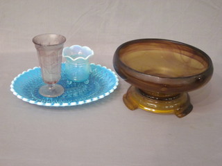 A circular green and grey glass pedestal bowl 9" together with pressed blue glass platter 11" and 2 vases