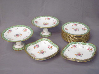 An 18 piece Aynsley dessert service comprising 2 comports 9", 2  square dishes 8", 2 oval dishes 10" and 12 plates - 2 cracked, 9"
