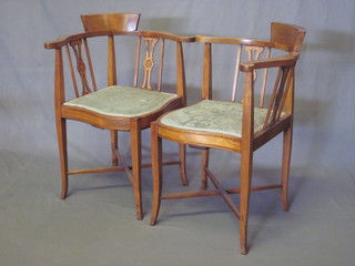 A pair of Edwardian bleached inlaid mahogany corner chairs,  raised on square tapering supports with X framed stretchers