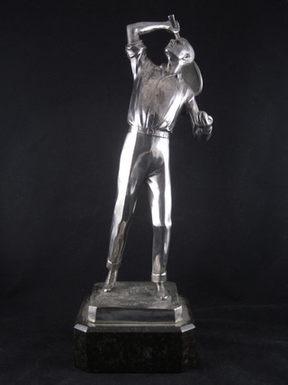 An Art Deco silver plated tennis trophy in the form of a  gentleman tennis player, raised on a marble base 16"