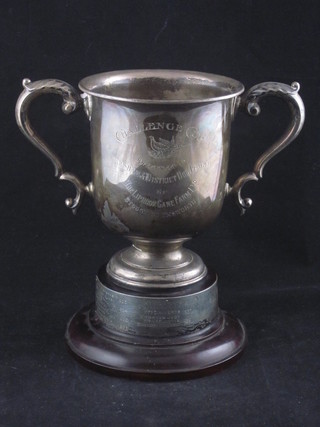 A silver twin handled trophy cup by Mappin & Webb 7 ozs   ILLUSTRATED