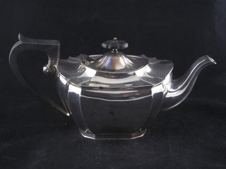 An oval silver plated teapot
