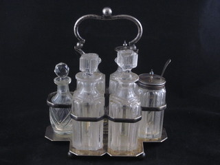 A silver plated and glass 6 bottle cruet set