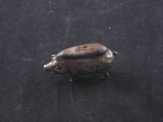 An Edwardian silver pin cushion in the form of a pig, London  1907 2 1/2"