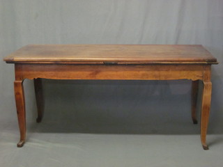 An 18th/19th Century French fruitwood refectory dining table, raised on cabriole supports 64 1/2"