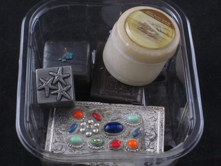 An Eastern metal trinket box with hinged lid, a carved horn vesta  case in the form of a book and 3 other small boxes