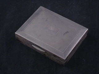 A silver cigarette box with engine turned decoration and hinged lid, 4"