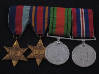 A group of 4 medals comprising 1939-45 Star, Burma Star,  Defence and War medal  ILLUSTRATED
