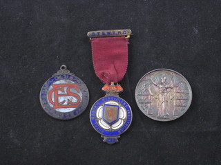 A silver and enamel Masonic charity jewel, a Territorial Army Association medal and an enamelled badge