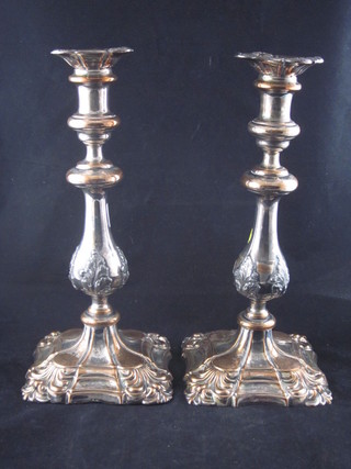 A pair of Rococo style silver plated candlesticks with detachable  sconces 12"