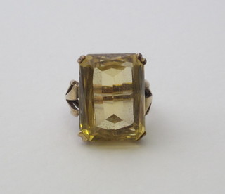A 9ct gold dress ring set a rectangular smoky quartz