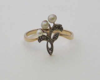 A lady's 9ct gold dress ring set 3 pearls and with diamonds
